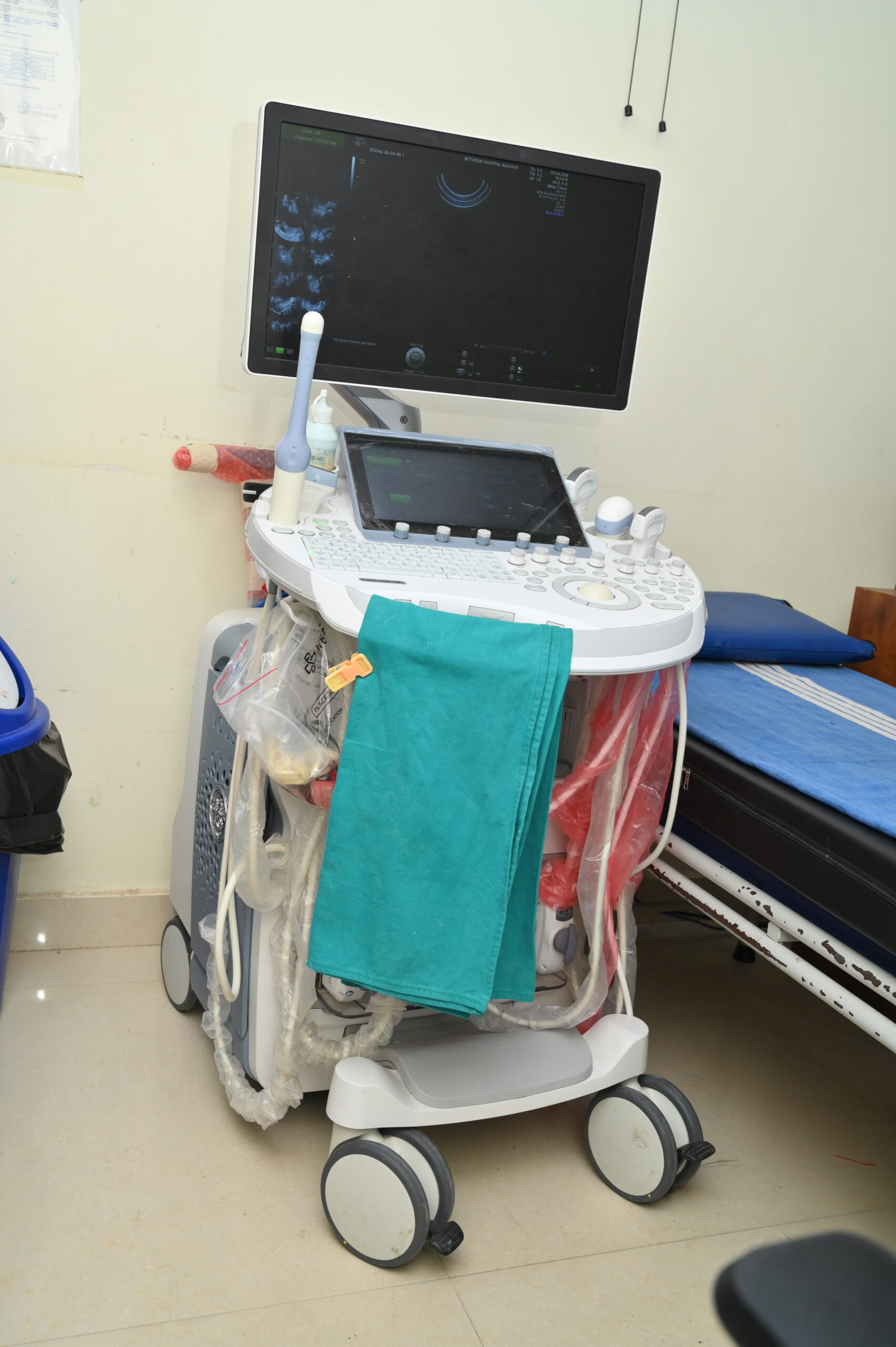 Sonologist performing abdominal ultrasound